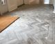 Reclaimed silver fox limestone 
brick veneer tile laid as flooring.